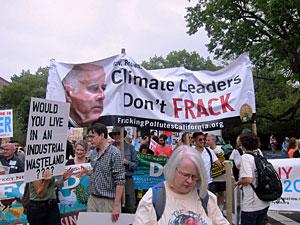 Signs and marchers at the people's climate march